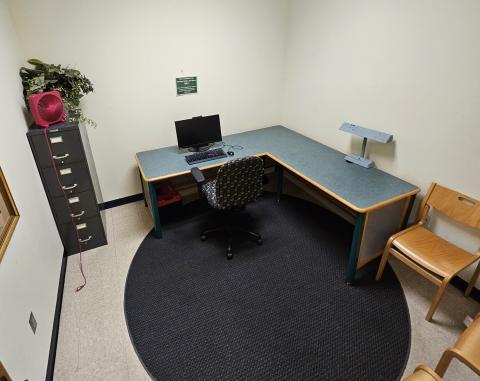 small study room with desk and computer 